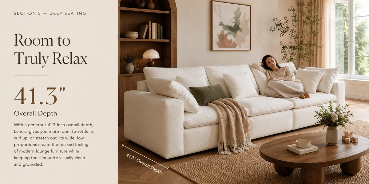 A large white sectional sofa in a styled living room with a woman reclining on the sofa. The image includes text overlays highlighting the sofa's deep seating and overall depth of 41.